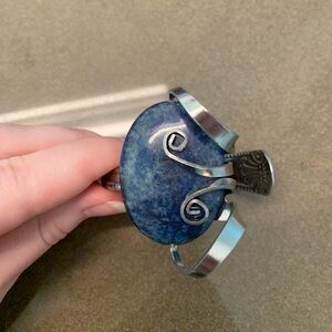 Handmade fork bracelet with large lapis lazuli stone from artisanal market.